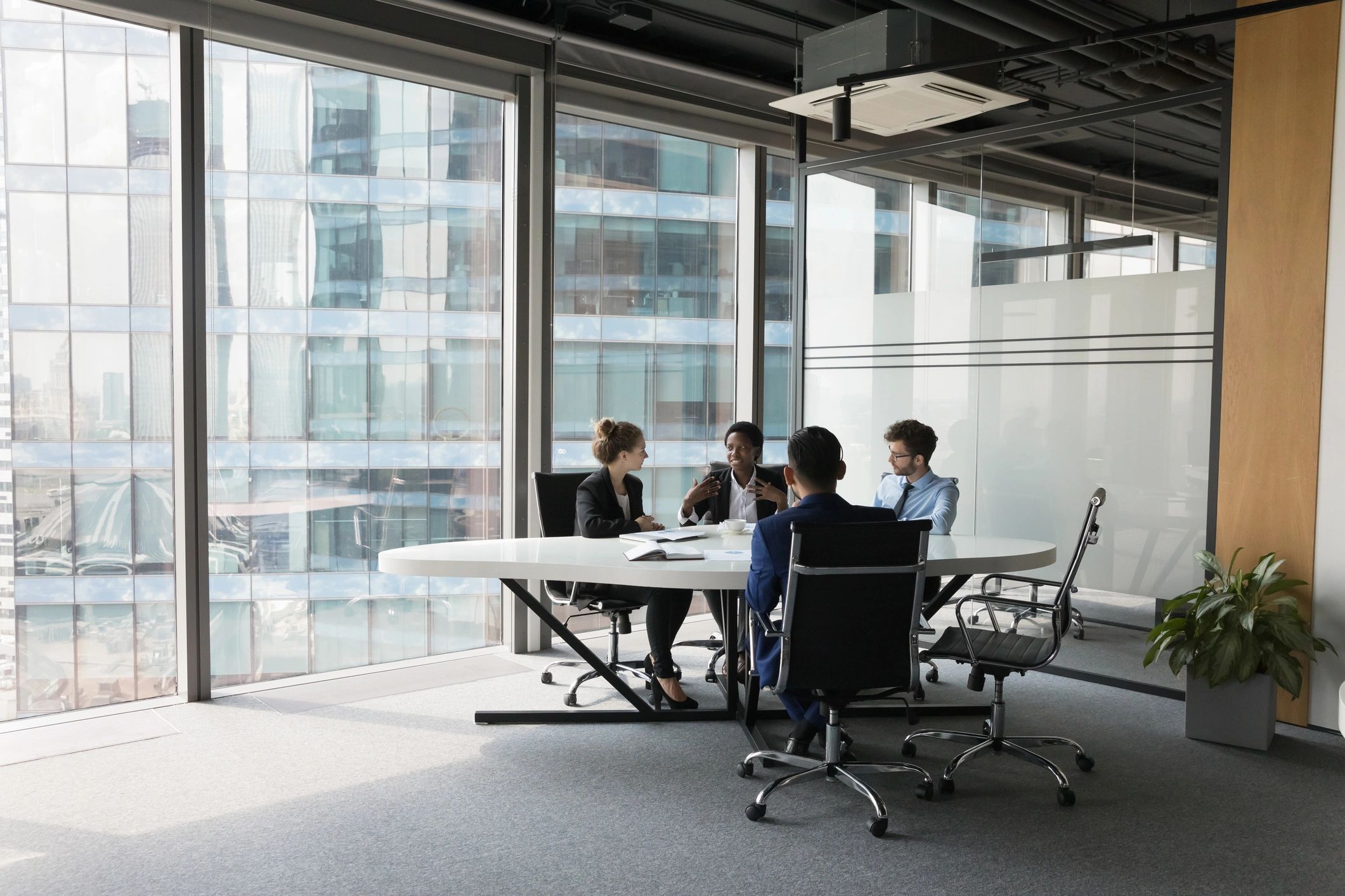 Editorial team meeting in a modern office