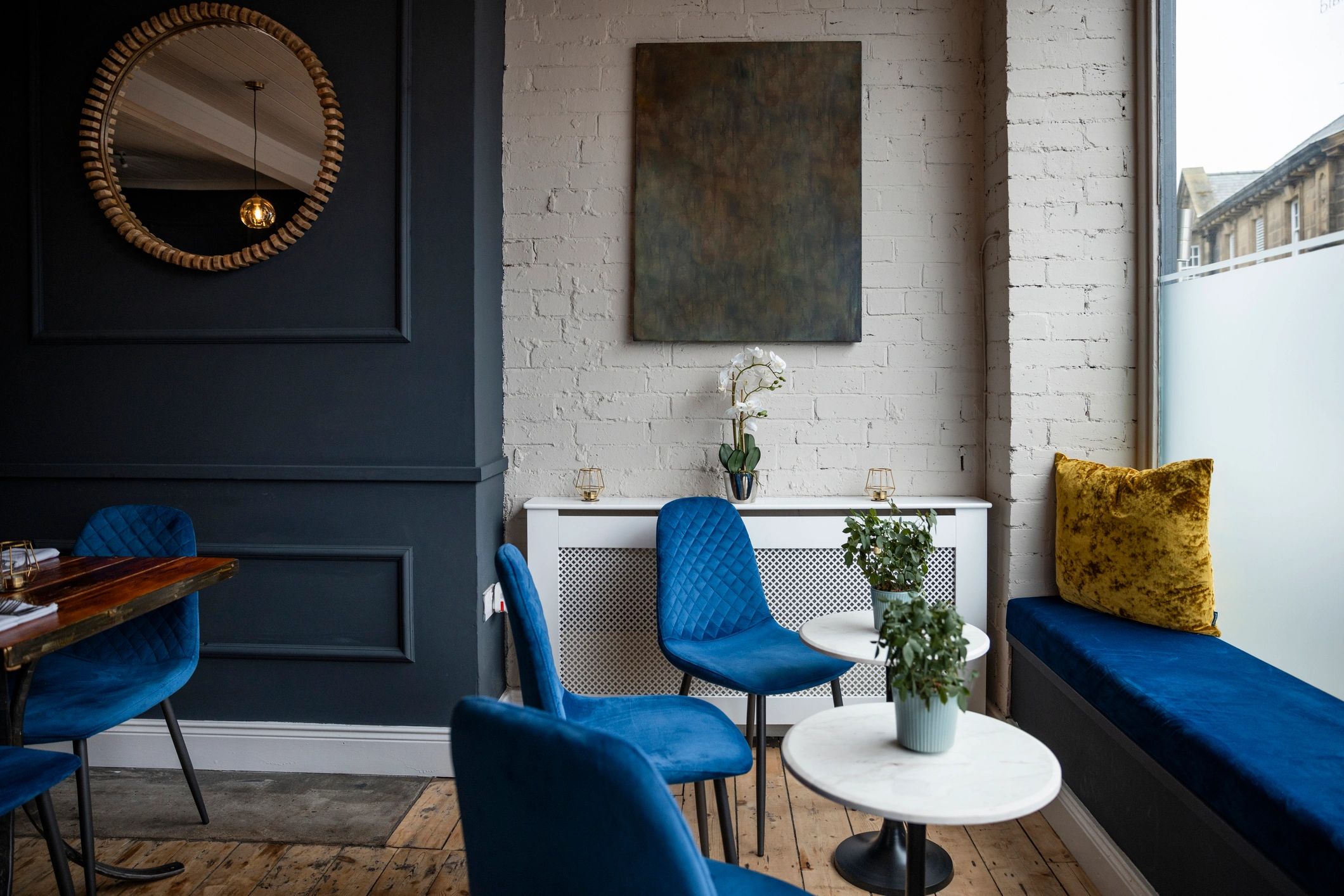Shared lounge interior representing amenity-led co-living operations